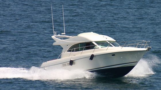 Front view of a boat traveling through the ocean