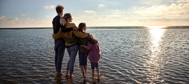 Family looking out over the ocean