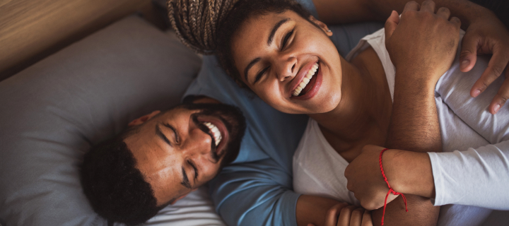 couple laughing and embracing