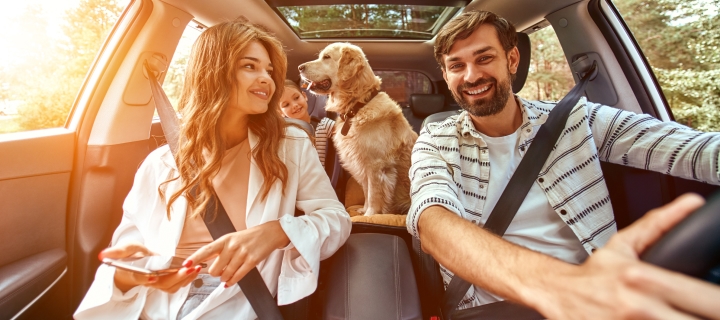 Family out for a drive in their car in California.